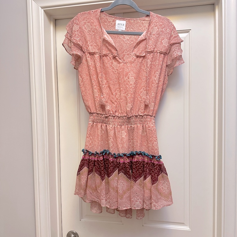 Only worn once. Cute lightweight and perfect for spring/summer parties:)
